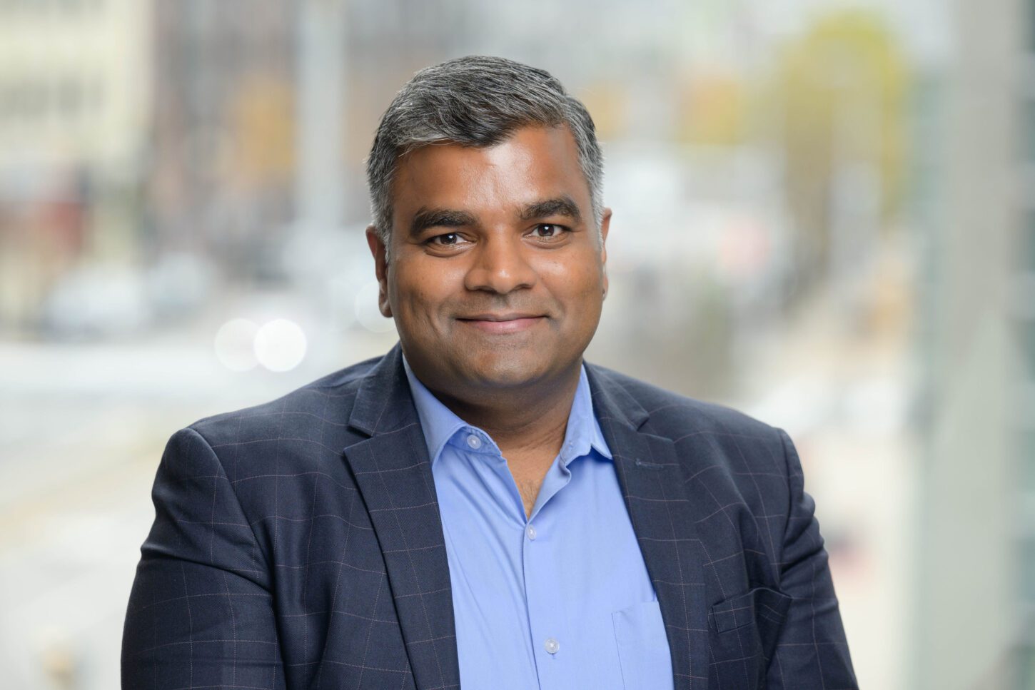 Headshot of Anuj Kumar