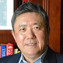 Headshot of Gan Wang